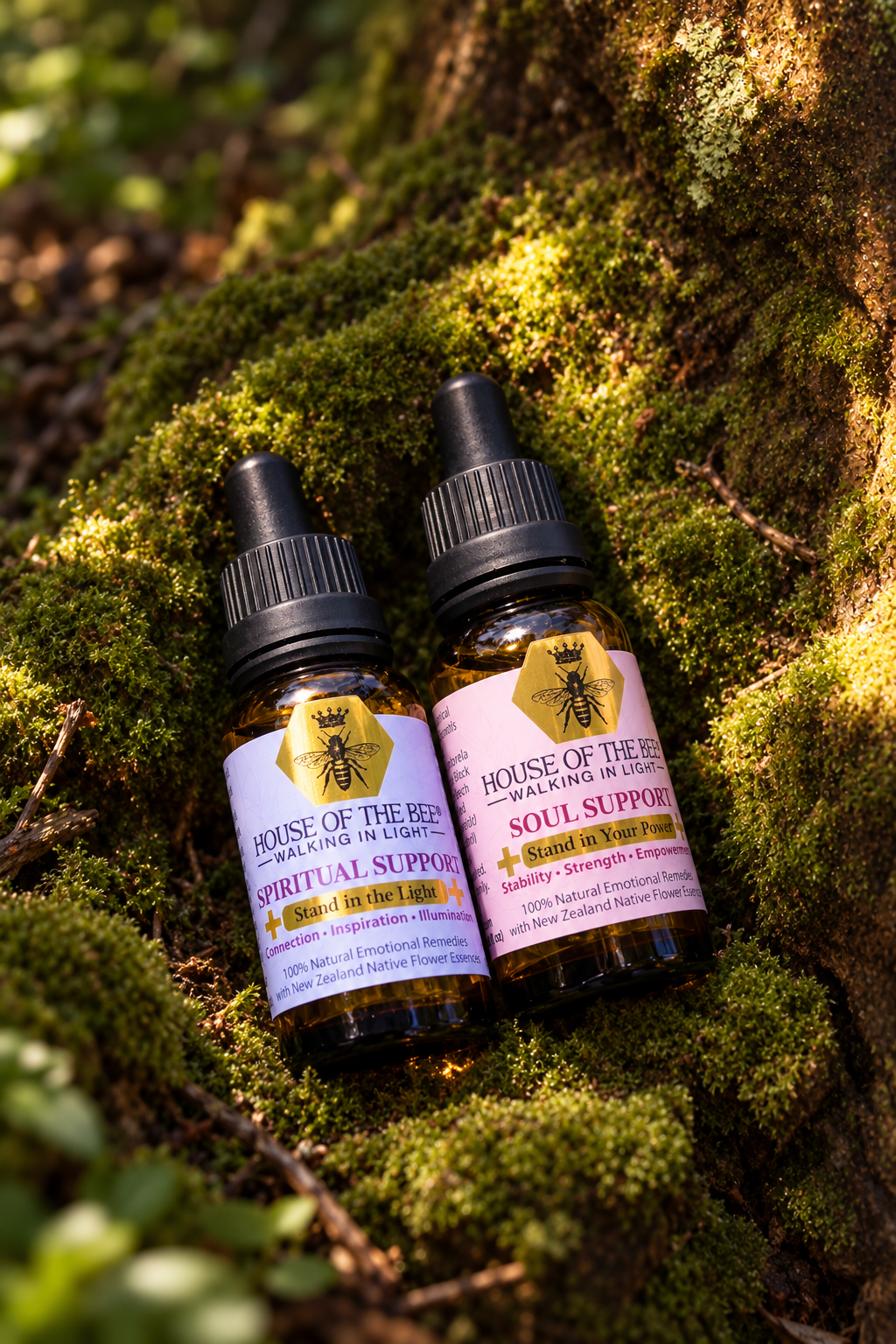 Spiritual Support and Soul Support Drops on moss, the two bottles in the Emergency and Support Kit